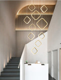 Asymmetrical Bola Halo LED Staircase Chandelier in Black/Gold for Split Level Entryway