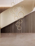 Asymmetrical Bola Halo LED Staircase Chandelier in Black/Gold for Split Level Entryway