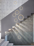 Asymmetrical Bola Halo LED Staircase Chandelier in Black/Gold for Split Level Entryway